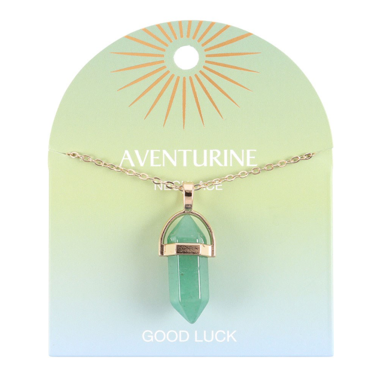 Green crystal Aventurine Crystal Pendant Necklace on display card that says good Luck