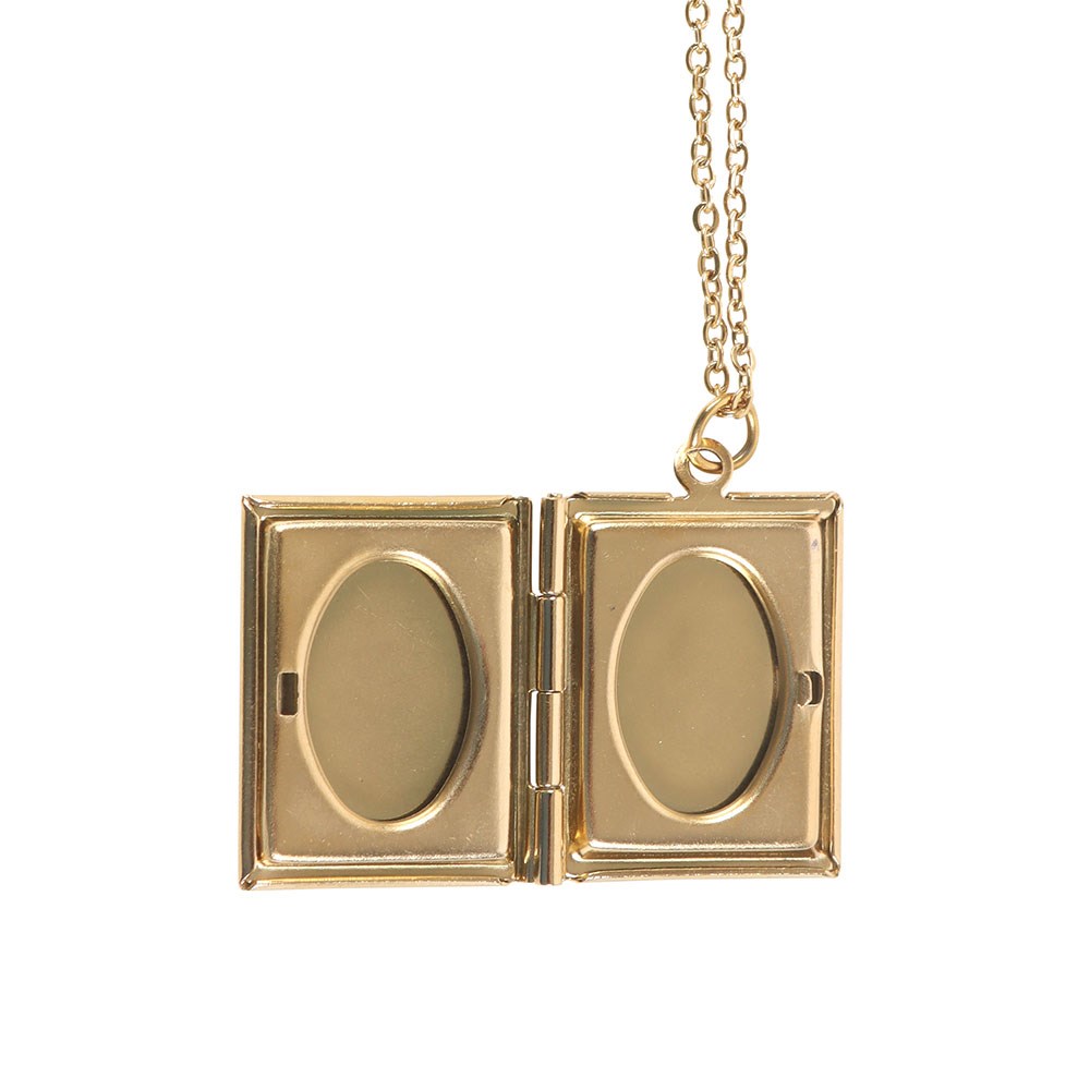 Gold book locket with chain on a white background