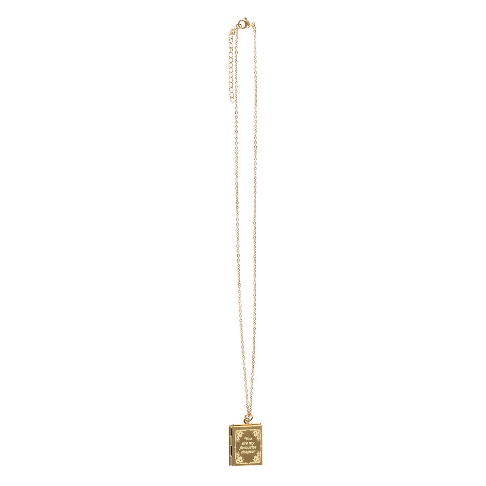 Gold necklace with a rectangular book locket pendant on a white background