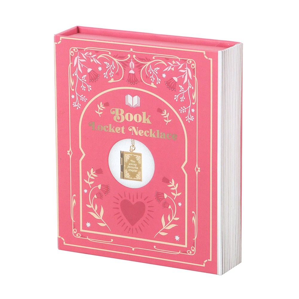 Pink book-shaped jewelry box with decorative elements on a white background