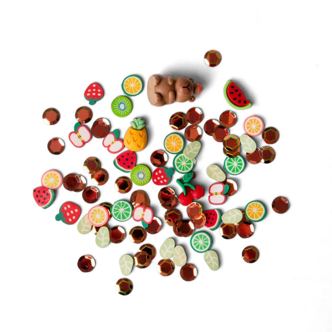Colourful fruit-shaped toys on a white background