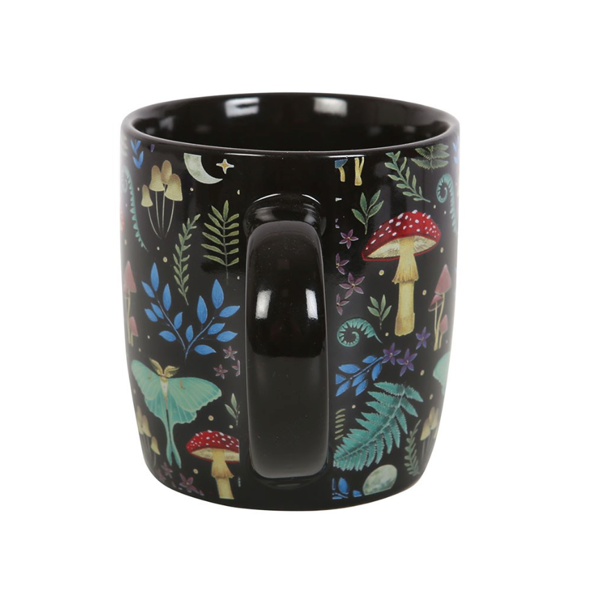 Dark forest all over print mug mushrooms, toadstools, luna moth and ferns on black background handle view