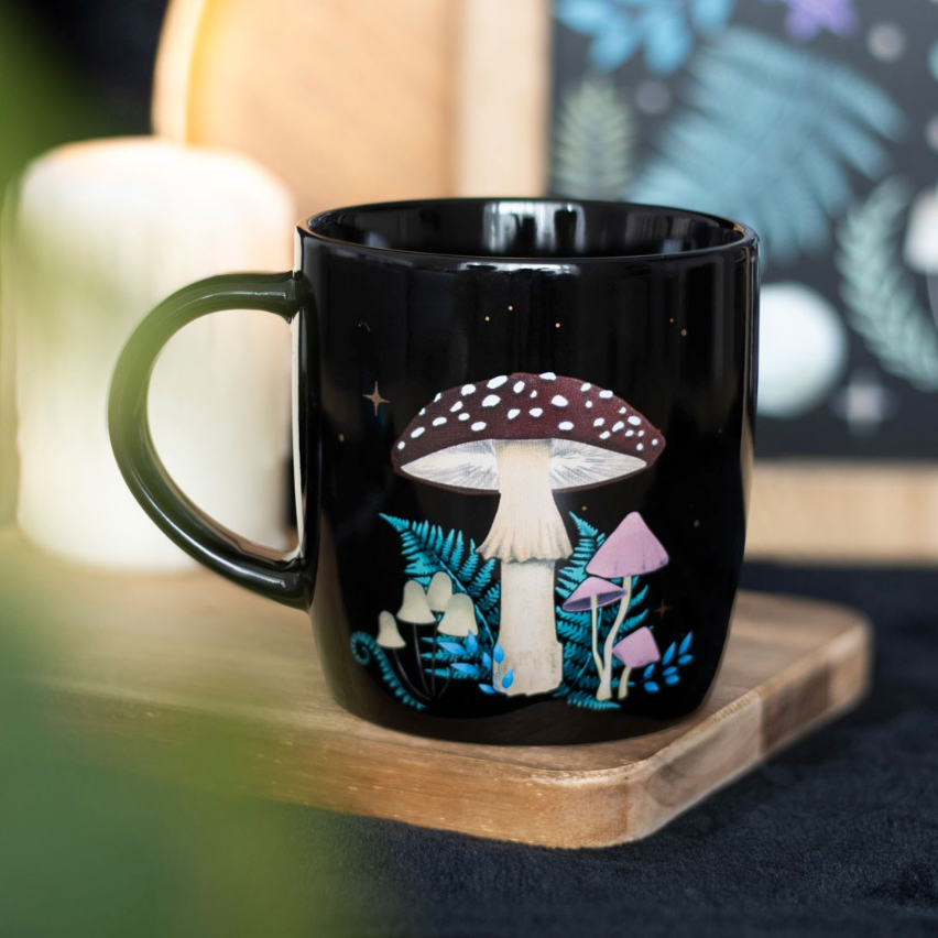 black forest mushroom mug with red, cream and pink mushrooms
