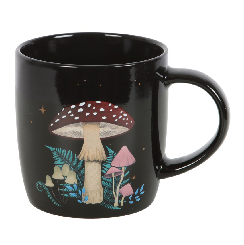 black forest mushroom mug with red, cream and pink mushrooms and stars