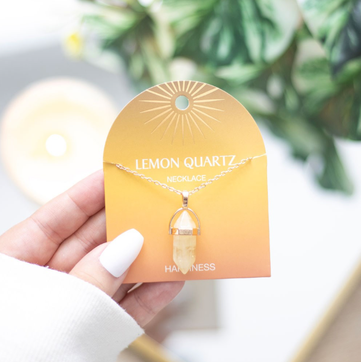 Lemon Quartz Crystal Pendant Necklace on card that says Happiness