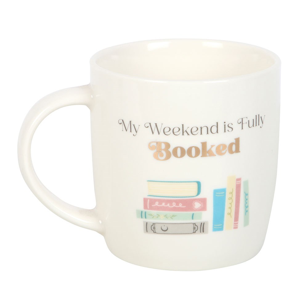 White mug with 'My Weekend is Fully Booked' text and book illustrations on a white background book mug
