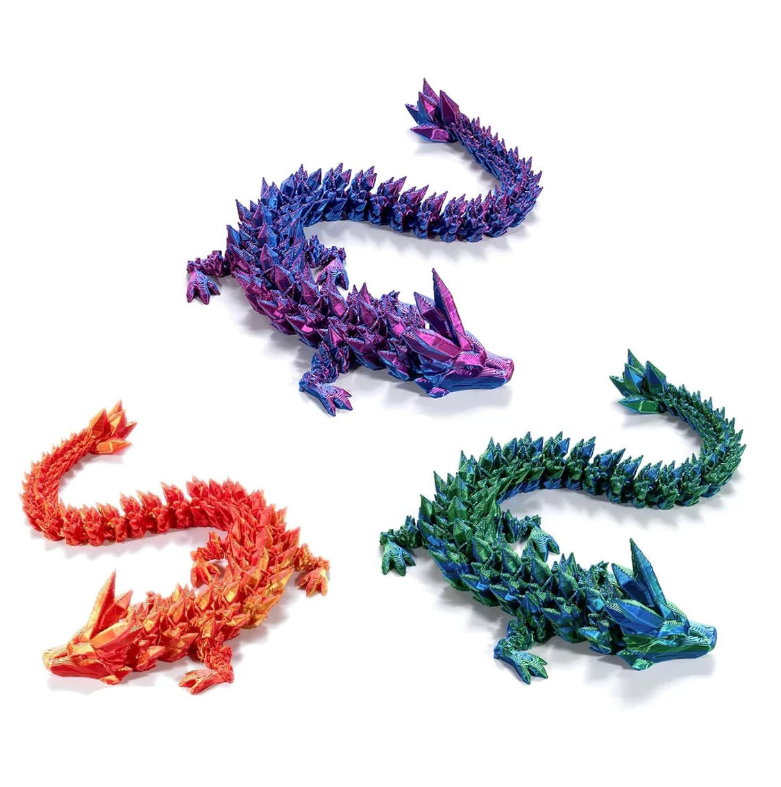 Three colorful dragon figurines in red, blue, and green on a white background