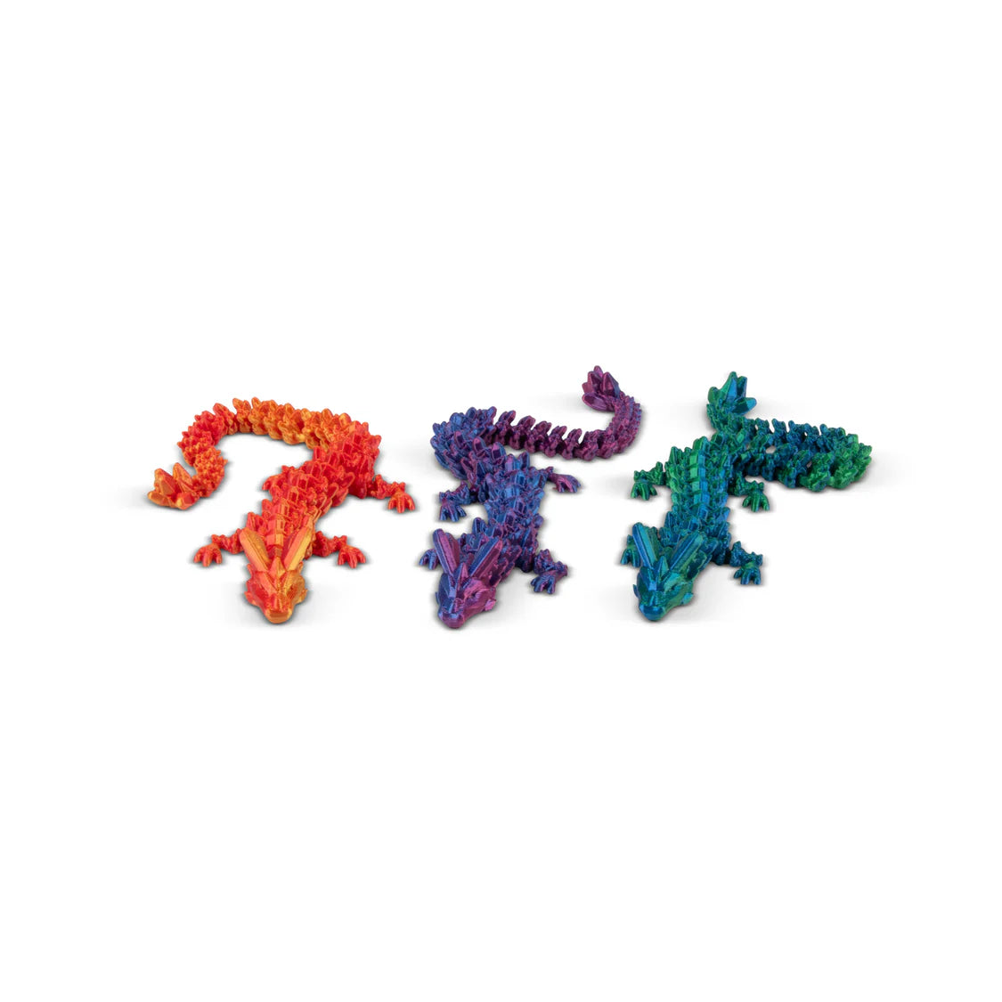 Three colorful lizard-shaped toys on a white background