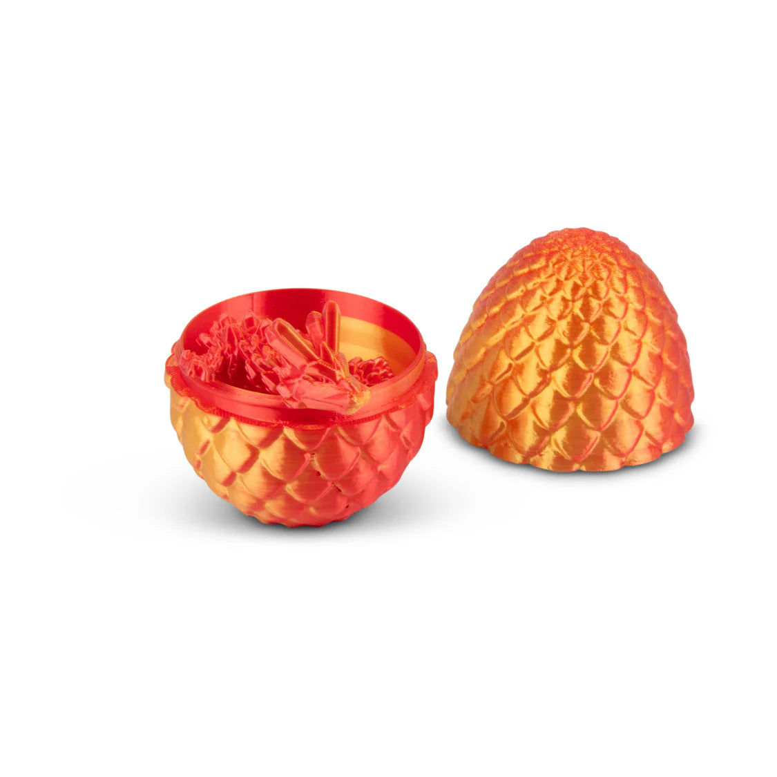 Two dragon egg-shaped containers with textured surface on a white background
