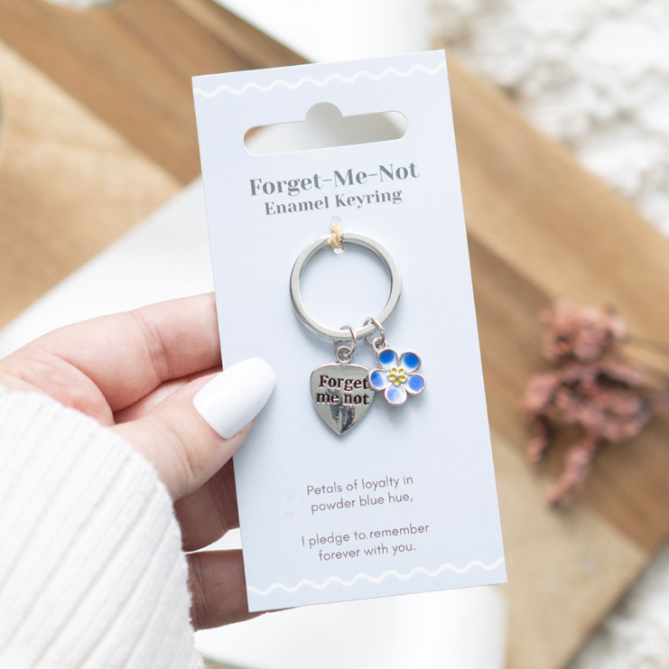 Blue and silver colour Forget-Me-Not Enamel Flower Metal Keyring on display card