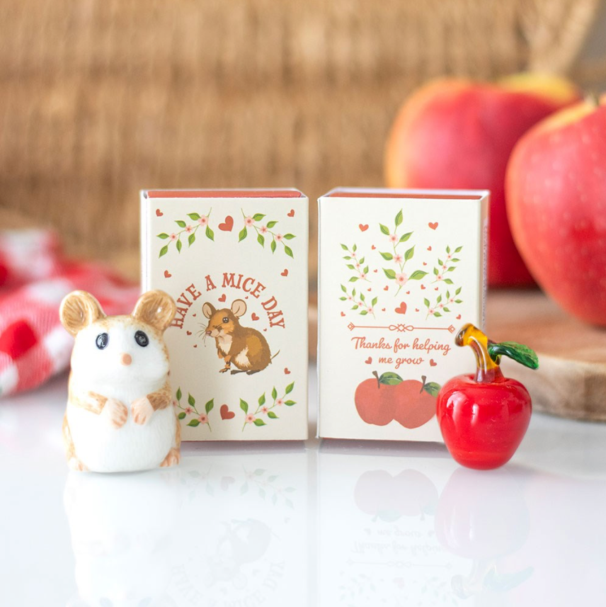 Glass Apples and Ceramic Mice in a Matchbox display