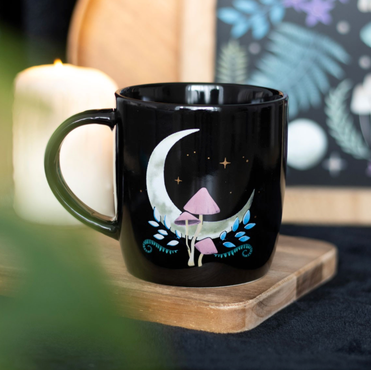 Dark Forest Mushroom Moon Mug a black mug with white crescent moon and pink mushrooms
