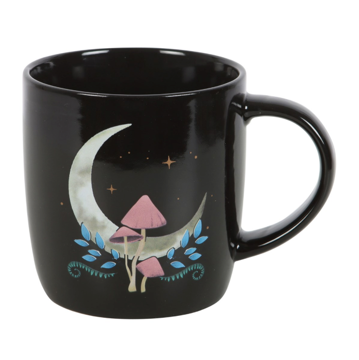 Dark Forest Mushroom Moon Mug a black mug with white crescent moon and pink mushrooms front view