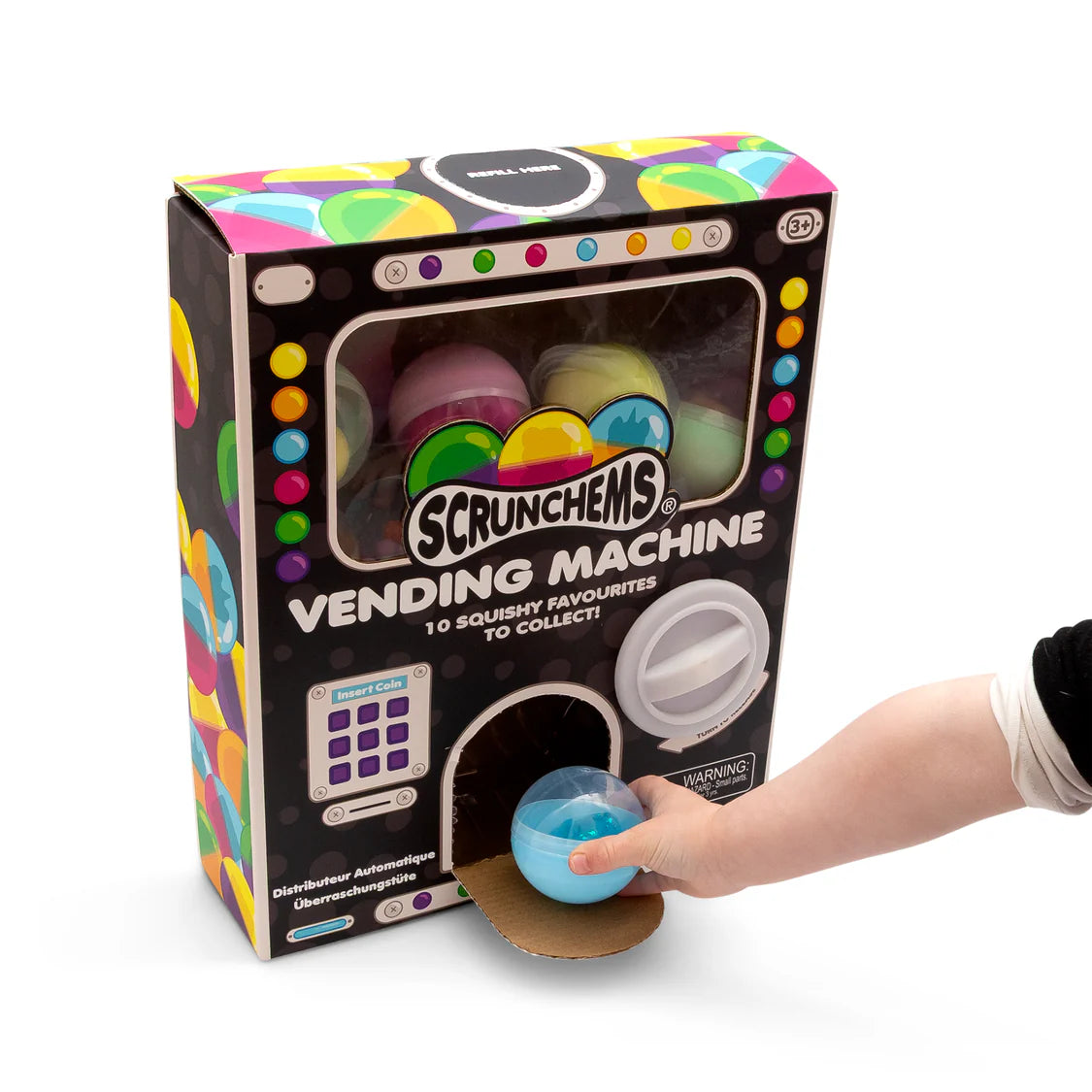Scrunchems Vending Machine toy packaging with a hand reaching in to take a blue ball out.