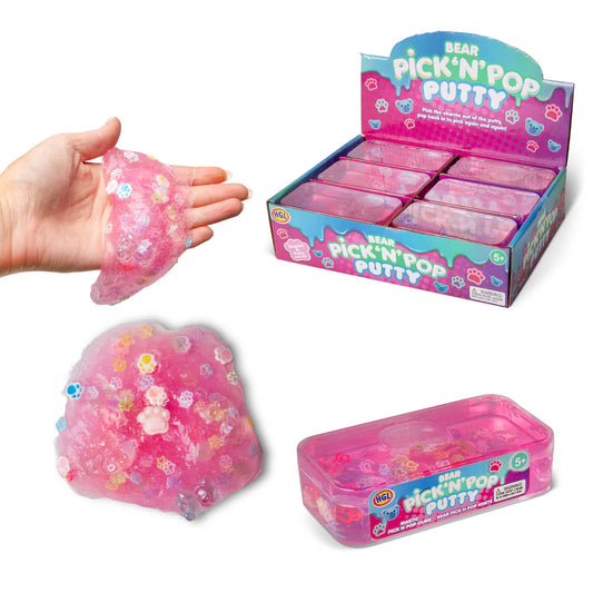 Pink putty with floral designs held by a hand, next to open and closed packaging of 'Bear Pick 'N' Pop Putty'.