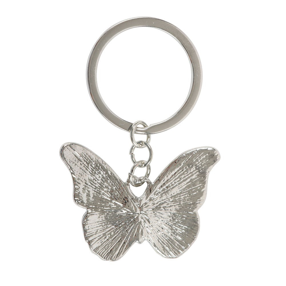 Silver butterfly keychain on a white background