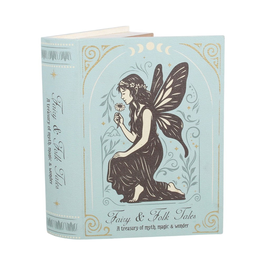 A decorative storage book box titled 'Fairy & Folk Tales' with a light blue cover, featuring an illustration of a fairy in black and brown, gold ornamental borders, and elegant script text.