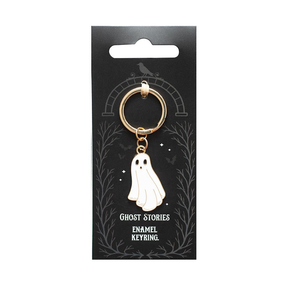 Ghost Stories enamel keyring on a black card with ghost illustrations