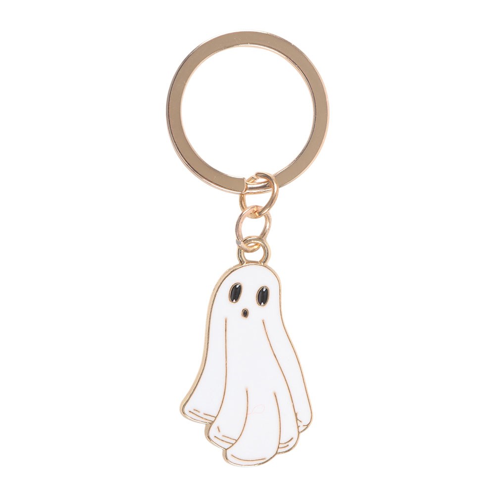 Ghost keychain with a gold ring on a white background