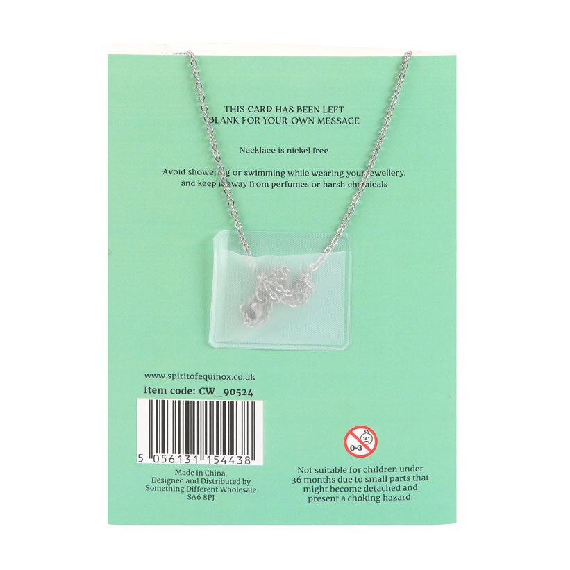 Green Aventurine Crystal Moon Necklace on Greeting Card back of card