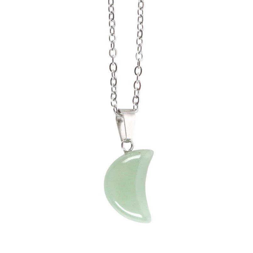 Necklace with a light green crescent moon pendant on a white background