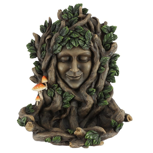 Wall plaque bird feeder of a green man goddess face surrounded by leaves and branches with mushrooms on a white background