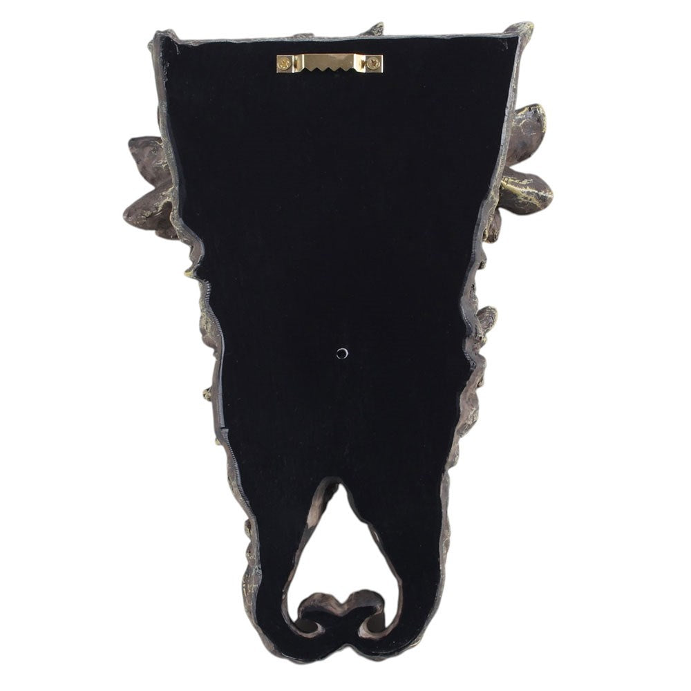Black decorative wall hook with intricate designs on a white background