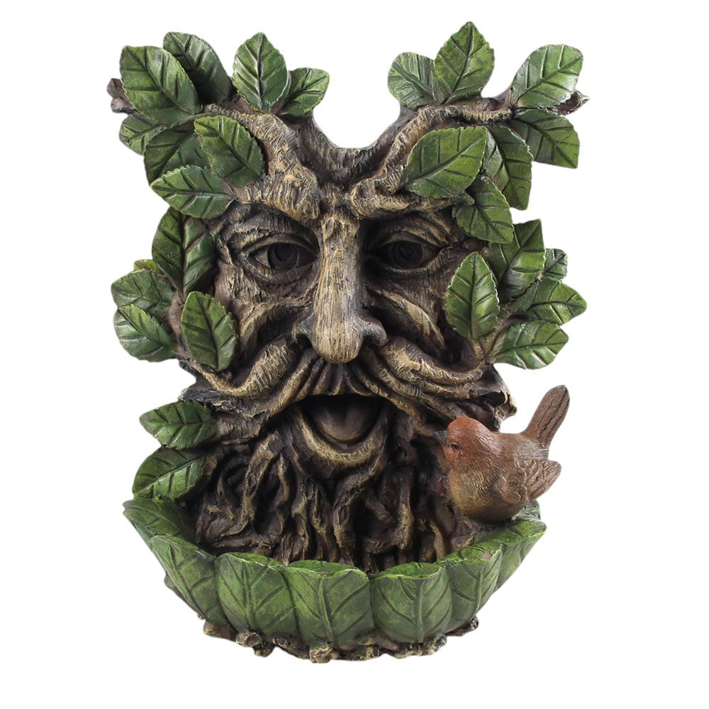Statue of a green man with leaves and a bird on a white background