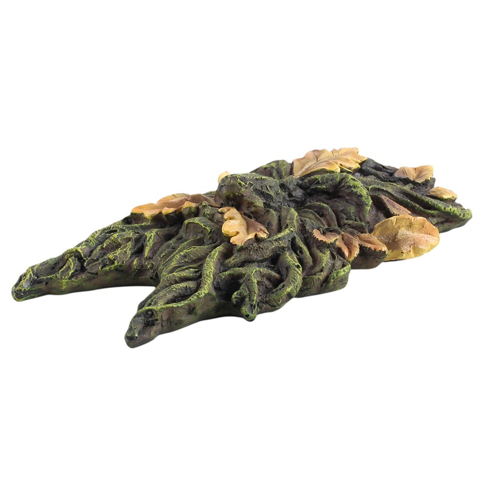Decorative piece resembling a leafy branch with green and brown leaves on a white background