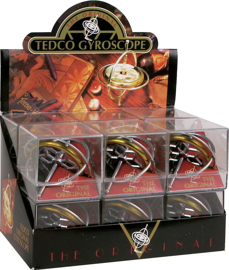 Display of Tedco Gyroscope toys in clear packaging with brand logo.