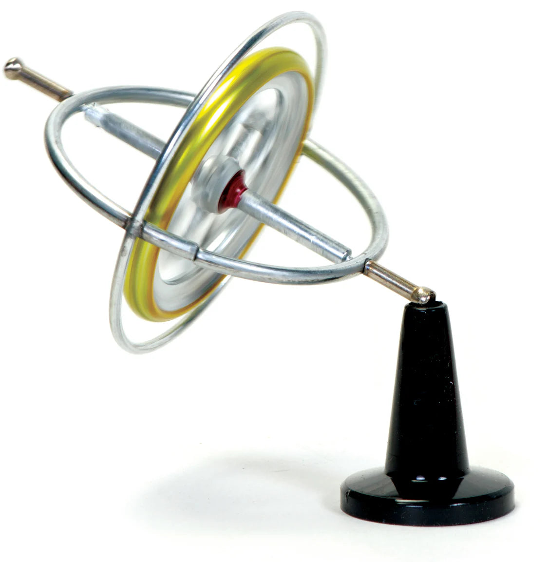 Spinning top gyroscope with metallic rings on a white background