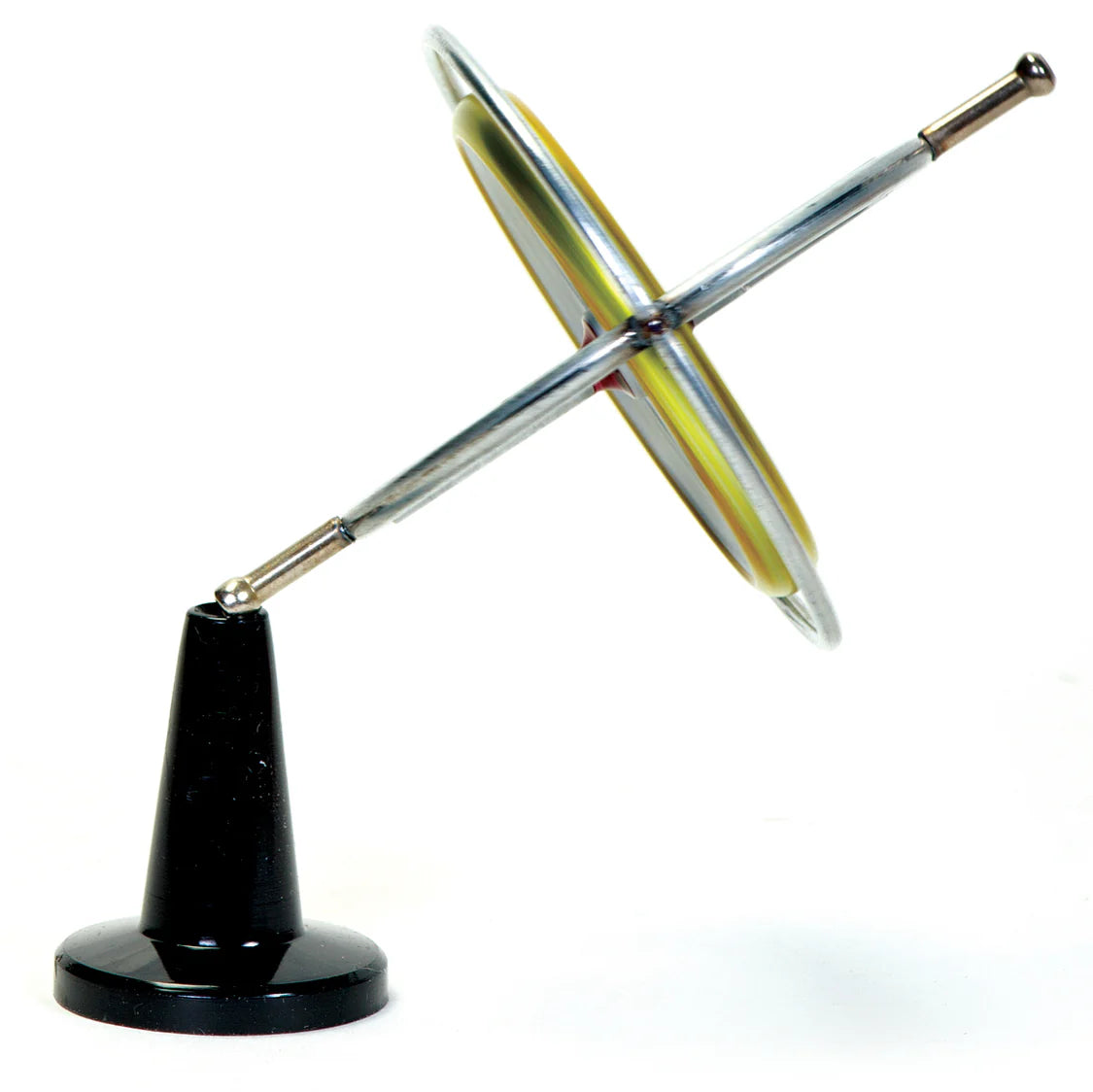 Metallic gyroscope on a black base against a white background