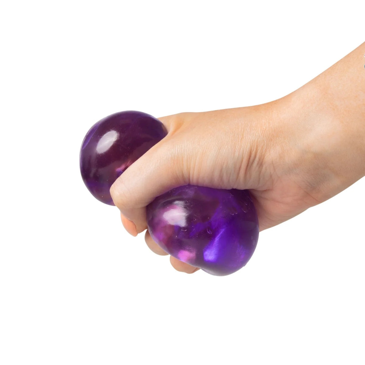 Hand holding a purple Scrunchems Sugar Cube against a white background