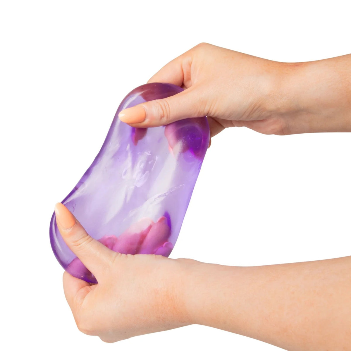 Purple Scrunchems Sugar Cube being held between two hands on a white background