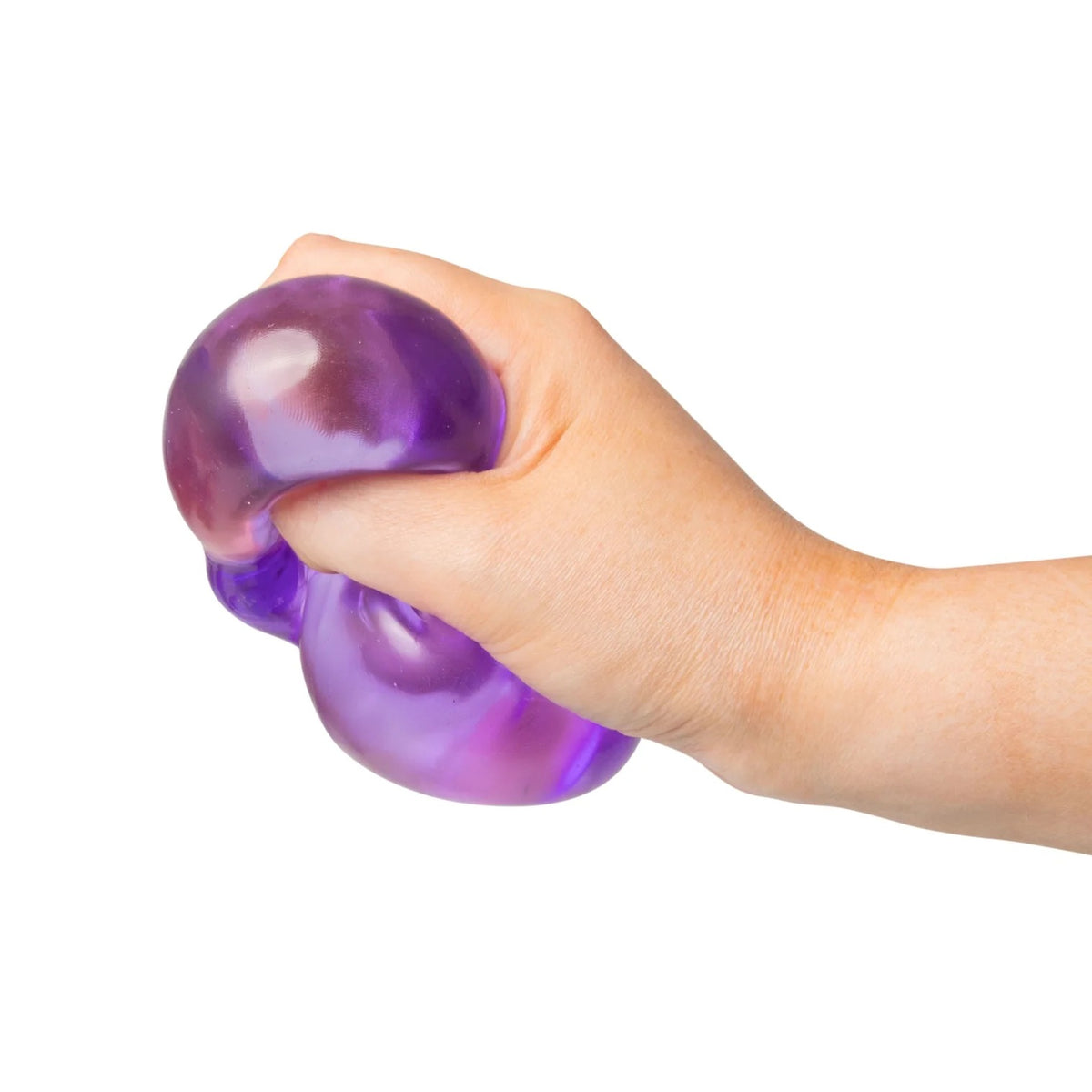 Hand holding a purple Scrunchems Sugar Cube against a white background