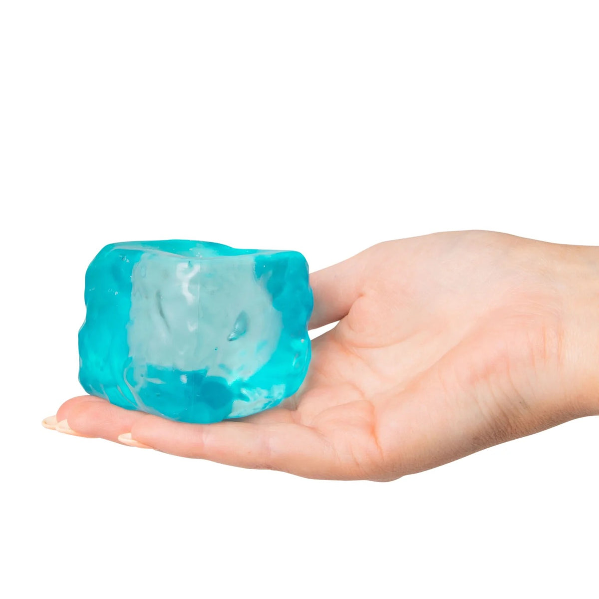 Hand holding a blue Scrunchems Sugar Cube against a white background