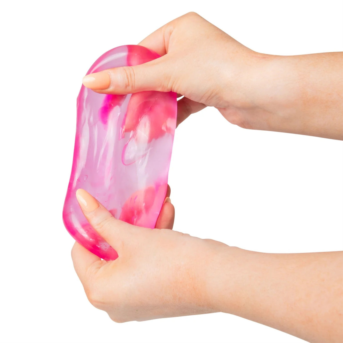 Hand holding a pink Scrunchems Sugar Cube against a white background