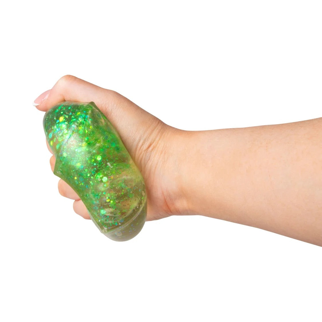 Hand holding a green Scrunchems Glitter Cube against a white background