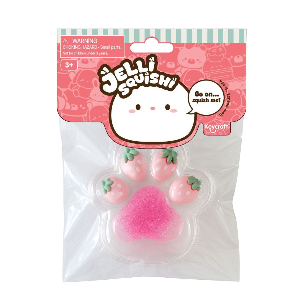 Jelly Squishi packaging with pink jelly-like toy and strawberry decorations on a white background