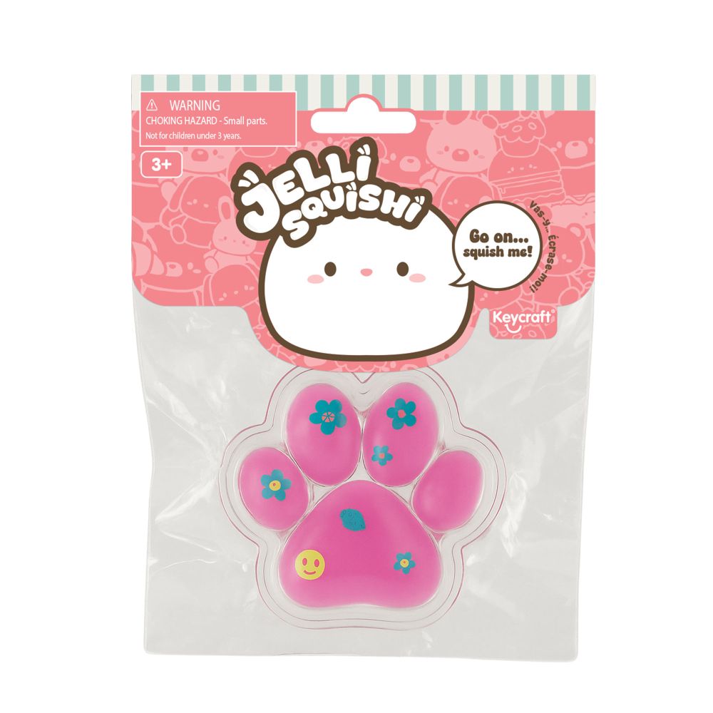 Pink paw-shaped squishy toy in packaging with Jelli Squishi branding.
