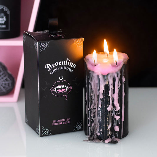Large Pink Vampire Tears Pillar Candle black candle with internal pink wax