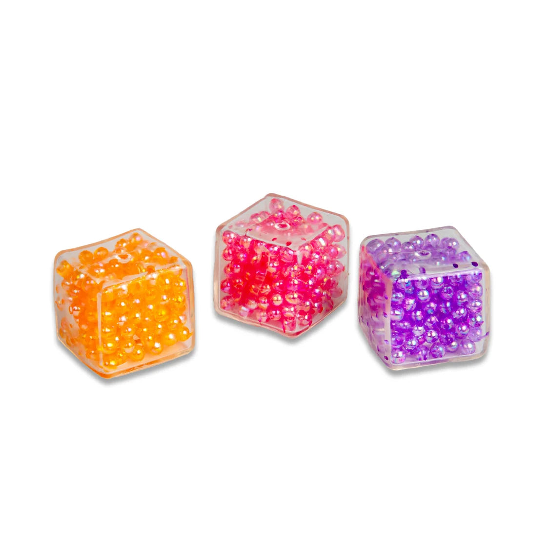 Three colourful ASMR Crunch Cubes with beads on a white background