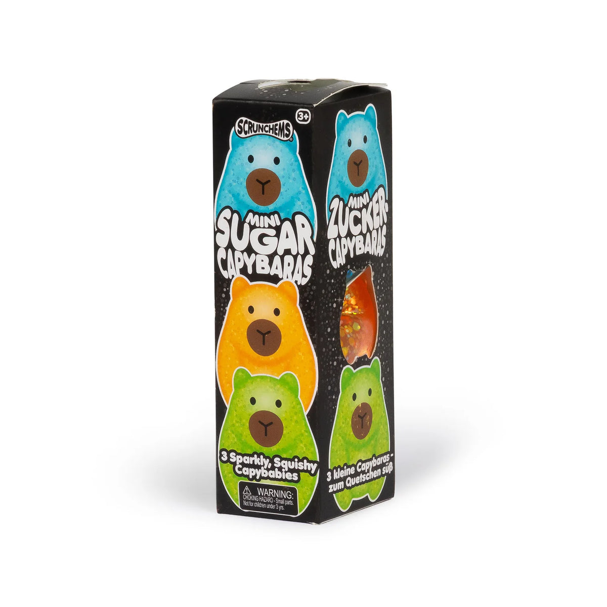 Scrunchems 'MiniSugar Capybaras' toy packaging box, featuring illustrations of four squishy capybaras in blue, orange, green, and light green on a black background.