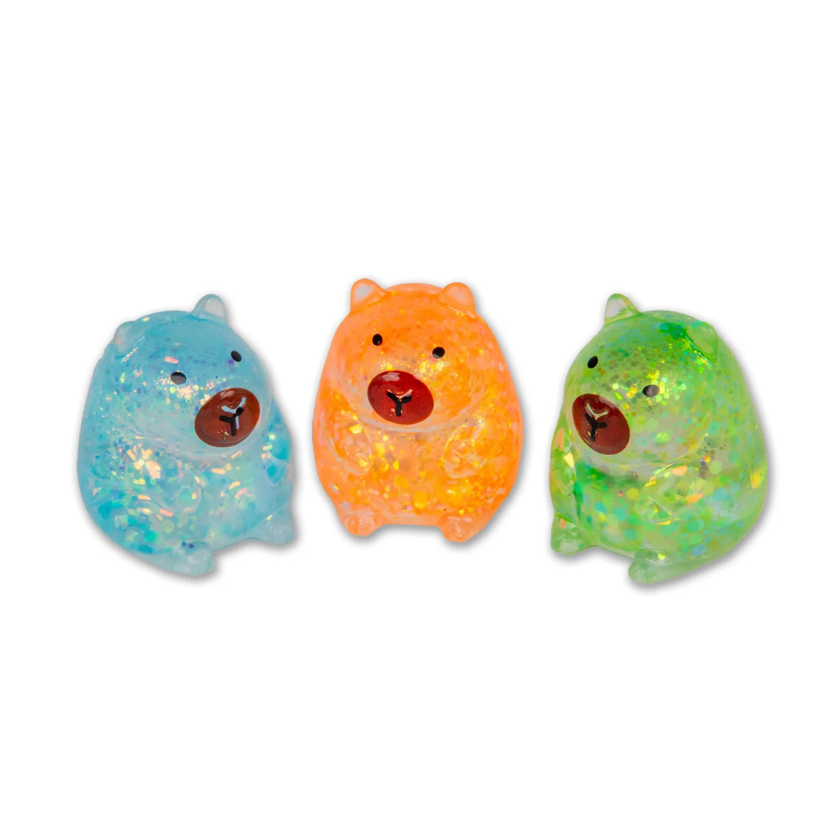 Three colourful mini sugar capybaras  on a white background