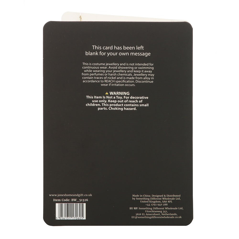 Back of a black card with text and a barcode on a white background