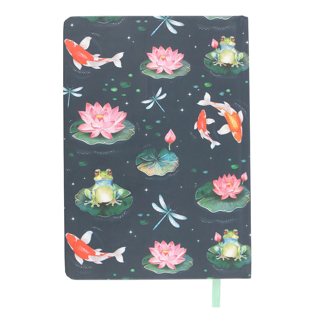 Notebook with a pond-themed cover featuring fish, frogs, and flowers on a dark background.