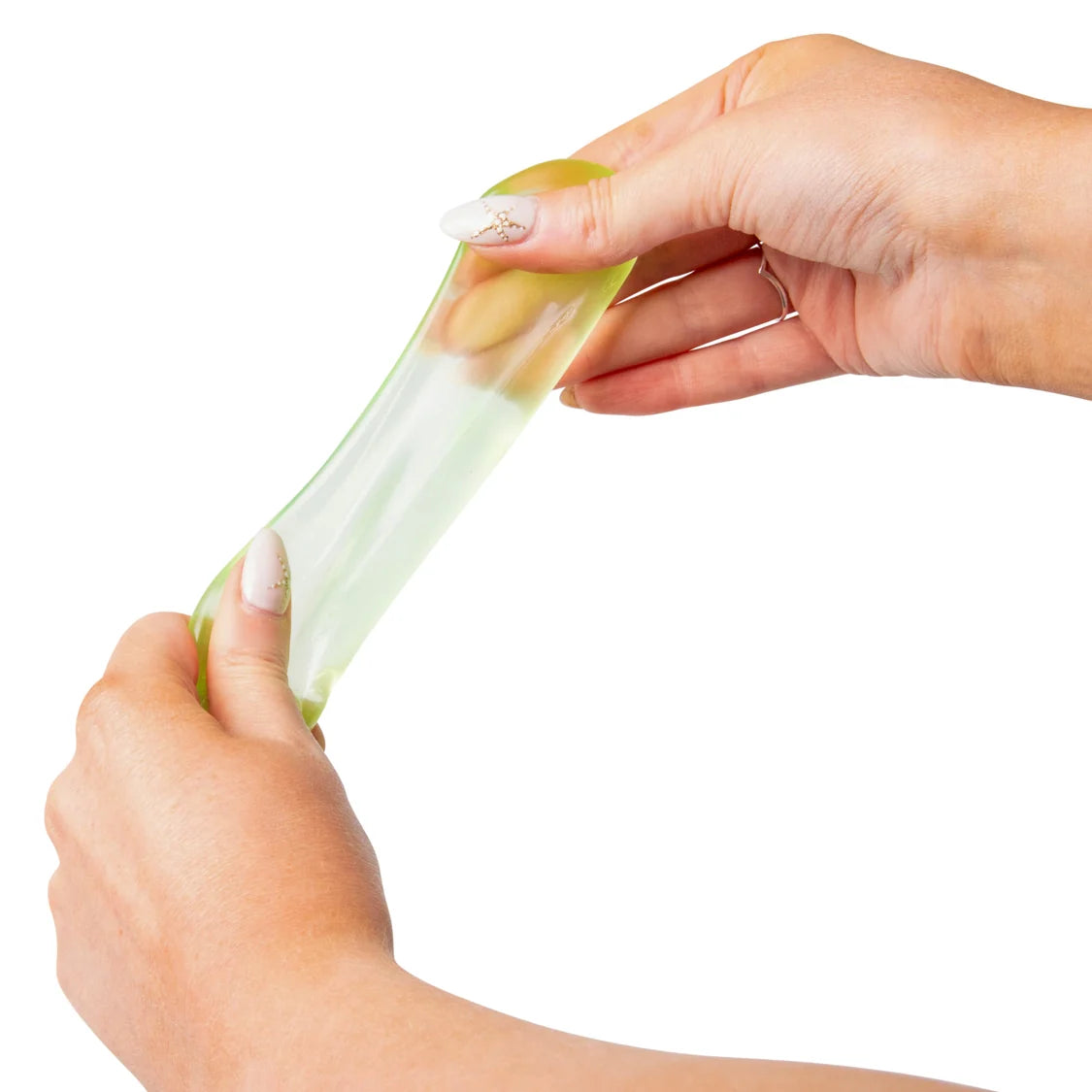 Hands holding a sugar cube with a white background