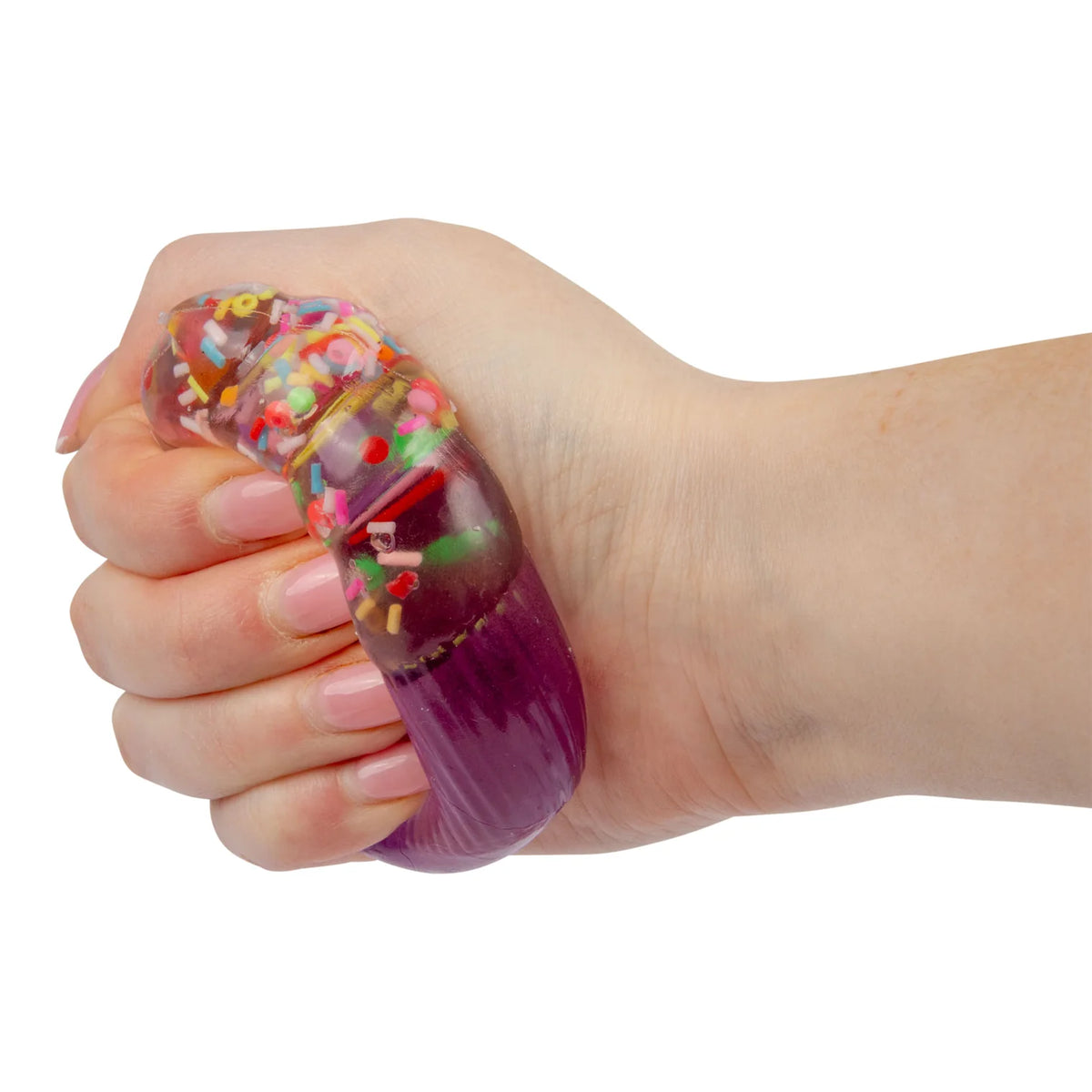 Hand holding a purple Scrunchems Sugar Cupcake on a white background