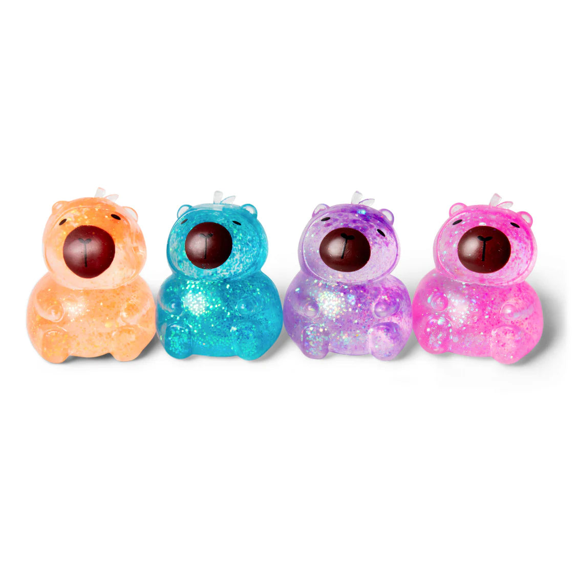 Four colourful glittery capybara squishies on a white background