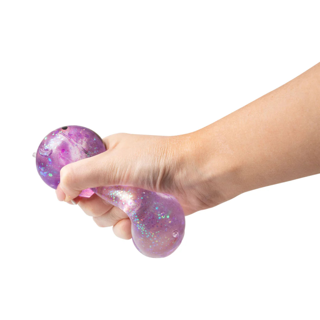 Hand holding a purple glittery stress ball against a white background